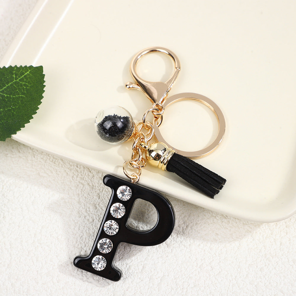 Llavero de resina negra con letras de diamantes de imitación, accesorio de arte moderno
