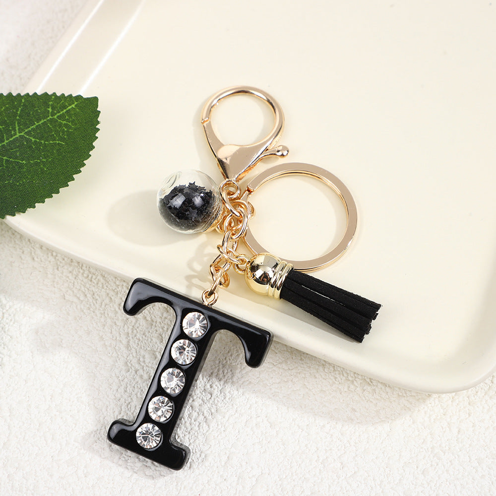 Llavero de resina negra con letras de diamantes de imitación, accesorio de arte moderno
