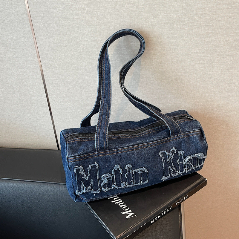 Bolsos de mezclilla con agujeros y bordado de letras vintage