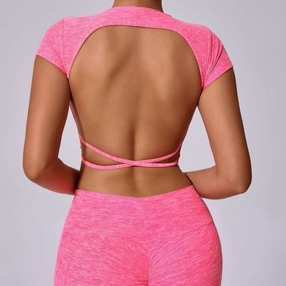 Top de yoga de manga corta de color liso sexy para mujer