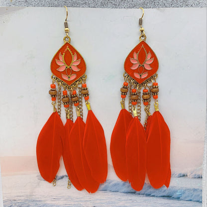 Pendientes bohemios con borlas de plumas y cuentas de flor de loto