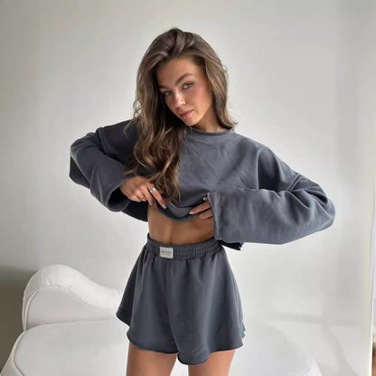 Conjunto de top corto de manga larga de color liso informal a la moda para mujer