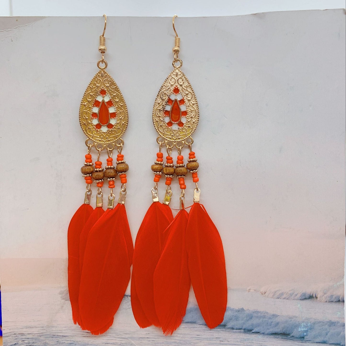 Boucles d'oreilles pendantes bohèmes vintage en perles et plumes