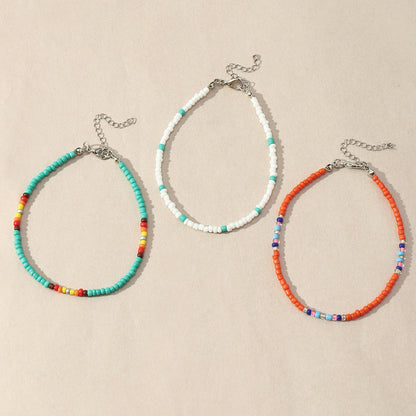 Conjunto de tobilleras con mini cuentas multicolores bohemias