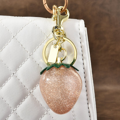 Llavero con colgante de resina de fresa multicolor para bolso