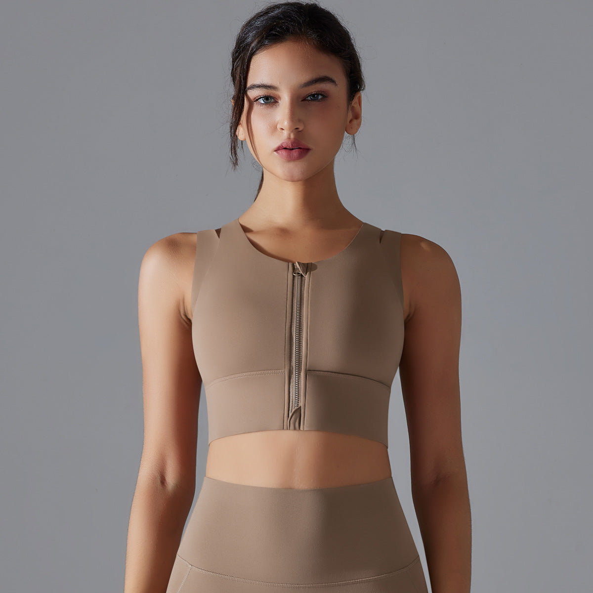 Soutien-gorge de sport sans manches à fermeture éclair pour femme
