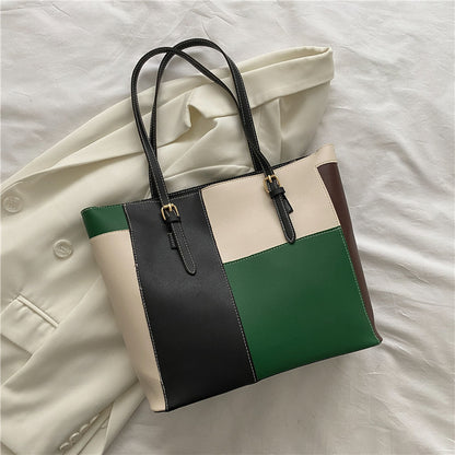 Bolso de mano de gran capacidad con costuras de moda en color