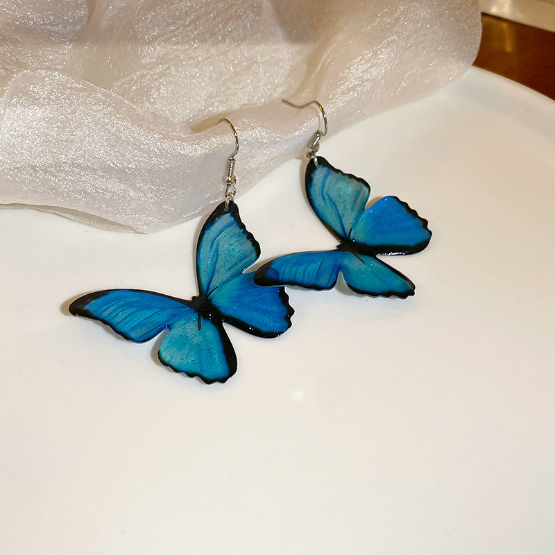 Conjunto de joyas de mariposa azul degradado estilo princesa con cadena de clavícula de aleación