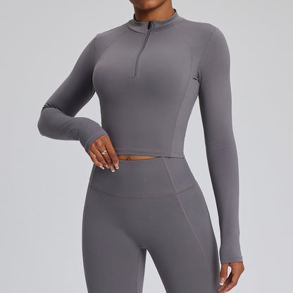 Top de yoga de manga larga de color liso para mujer, con cremallera y tejido de secado rápido