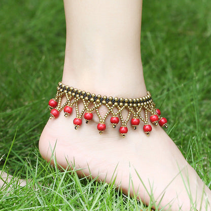 Tobillera bohemia con borlas trenzadas hechas a mano