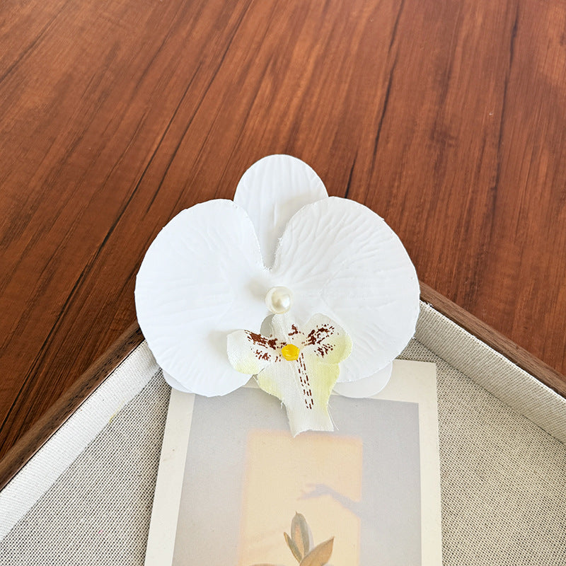 Accesorios florales para el cabello con mariposas para la playa