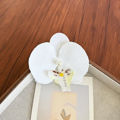 Accesorios florales para el cabello con mariposas para la playa