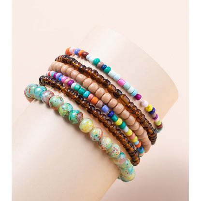Conjunto de pulseras en capas con minicuentas multicolores bohemias
