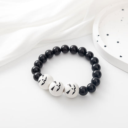 Pulsera de cuentas de Halloween con calabaza y calavera de dibujos animados