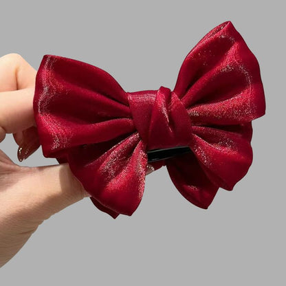 Elegante broche con lazo de color liso para mujer