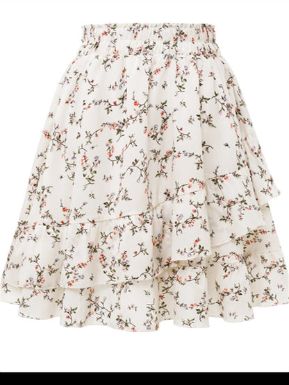 Falda elegante con volantes y estampado floral irregular a la moda para mujer