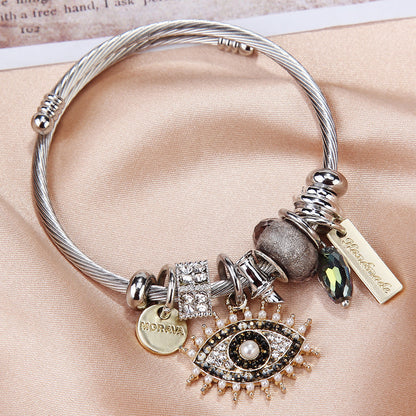 Pulsera exquisita con colgante de ojo de diablo y diamantes de imitación para mujer