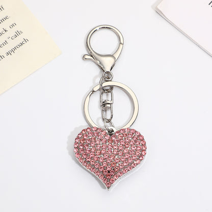 Llavero con colgante de corazón de diamantes de imitación para mujer