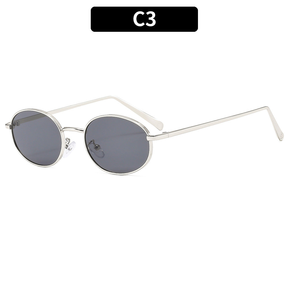 Gafas de sol ovaladas retro con montura metálica elegante