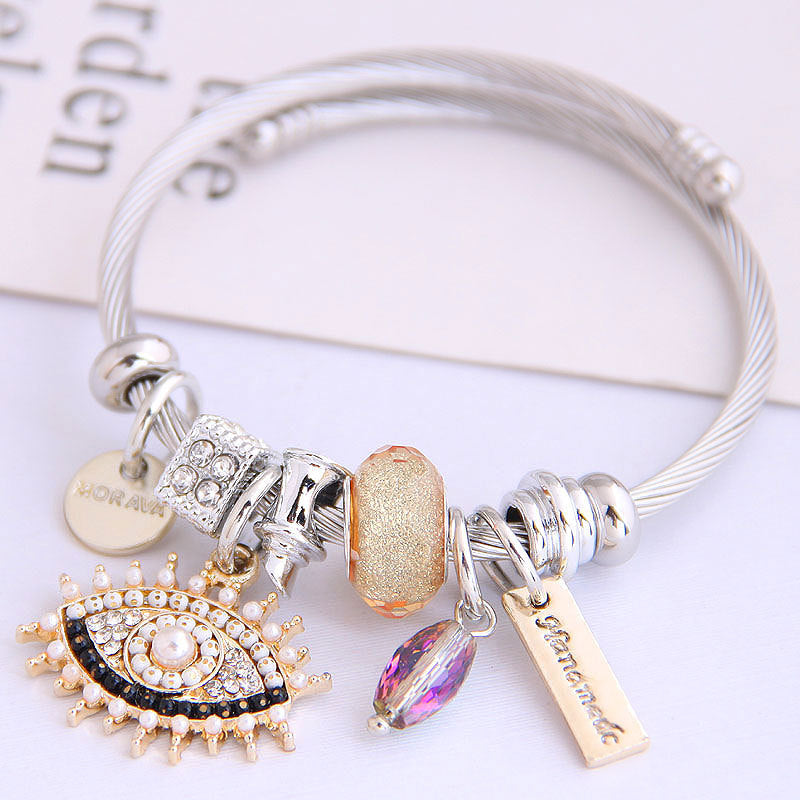 Pulsera de acero inoxidable con diseño vintage de mal de ojo para mujer