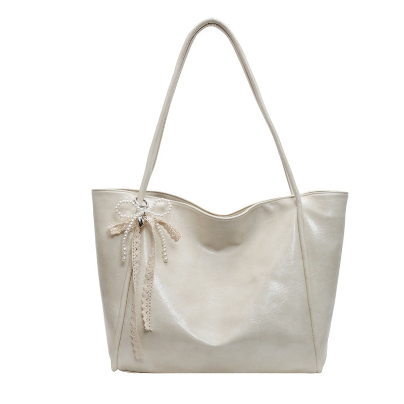 Bolso tote retro de piel encerada con aceite para mujer con colgante de lazo