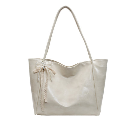 Bolso tote retro de piel encerada con aceite para mujer con colgante de lazo