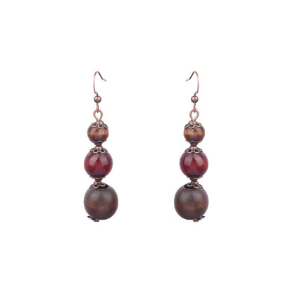 Boucles d'oreilles à pompons rétro de style ethnique bohème