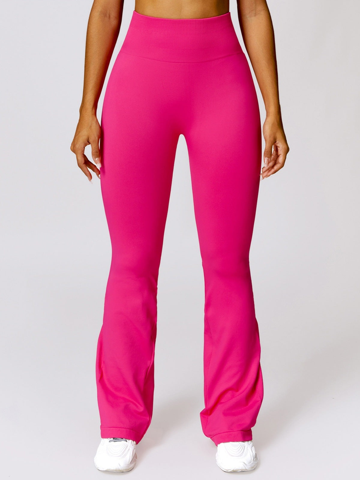 Pantalones deportivos acampanados de color liso de moda de yoga para mujer