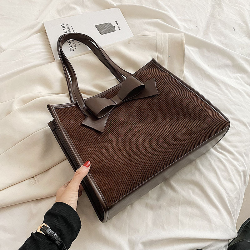 Bolso de mano de verano para mujer, de color liso y moderno.