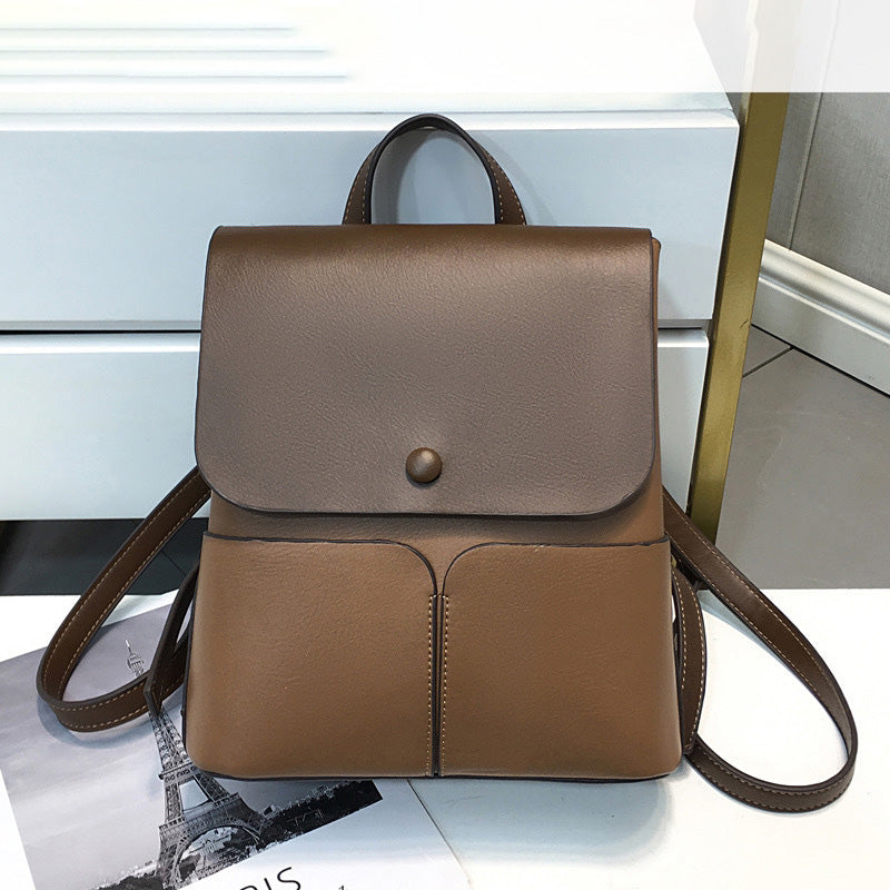 Mochila informal de lona con bloques de colores para mujer con gran capacidad