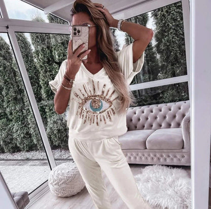 Conjunto de dos piezas con cuello en V y estampado de lentejuelas de ojo de diablo
