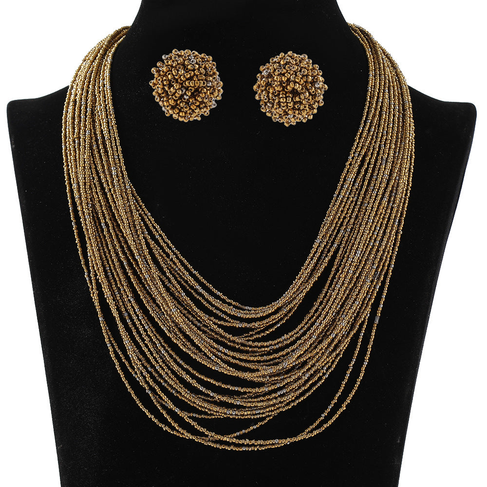 Conjunto de collar y pendientes con cuentas de arroz multicapa estilo bohemio para mujer