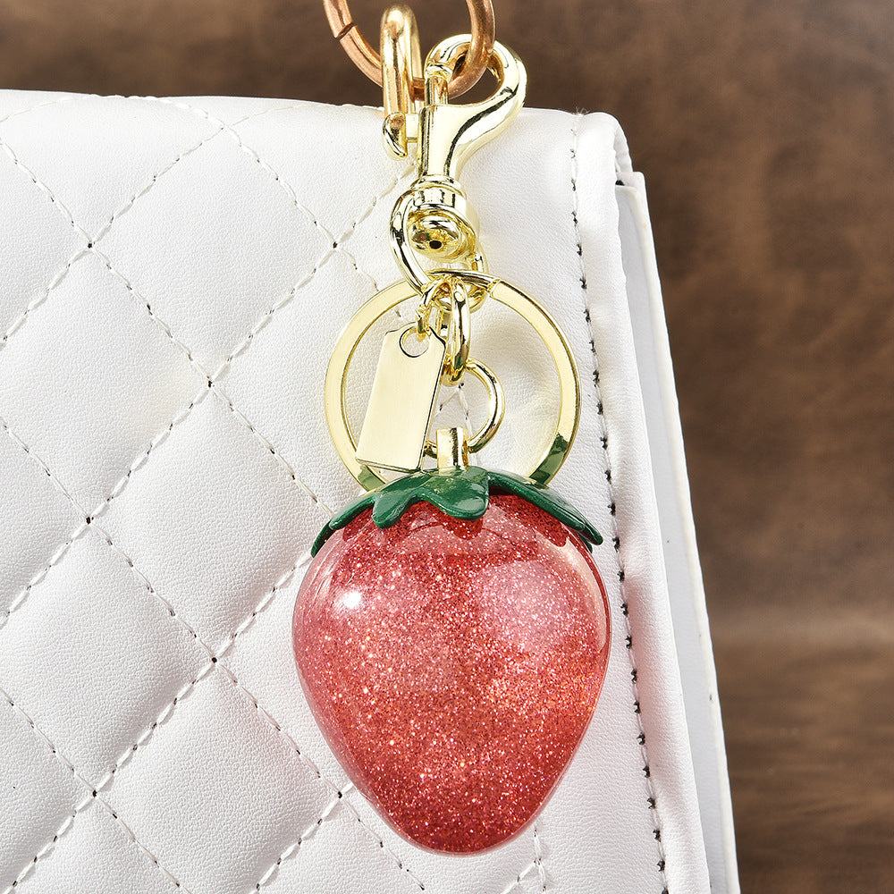 Llavero con colgante de resina de fresa multicolor para bolso