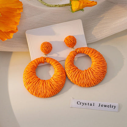 Boucles d'oreilles rondes creuses tissées de style bohème pour les fêtes