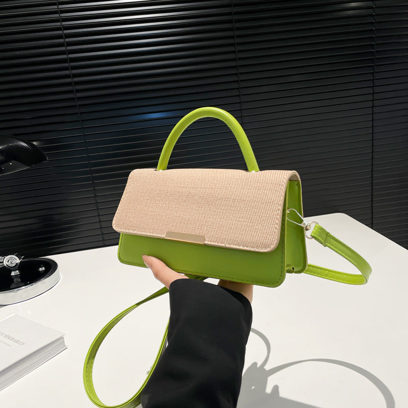 Bolso de mano con costuras abatibles de moda - Tendencia urbana
