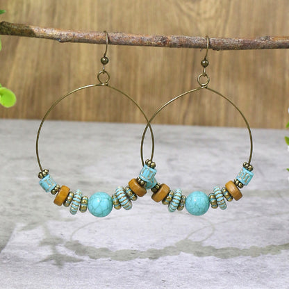 Boucles d'oreilles à pompons créatives de style ethnique bohème rétro