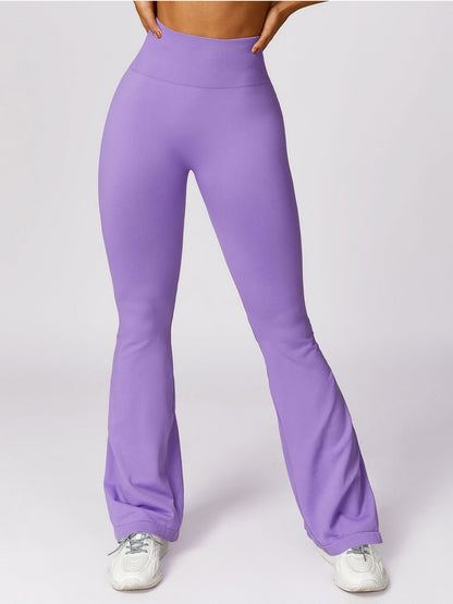 Pantalones deportivos acampanados de color liso de moda de yoga para mujer