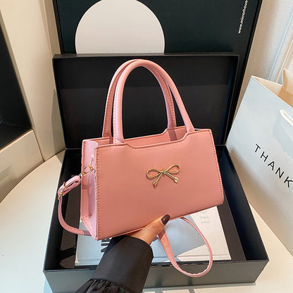 Bolso de mano informal de PU de color sólido con hebilla de lazo para mujer