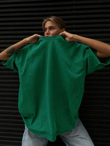 Camiseta informal holgada de manga corta en color liso para mujer