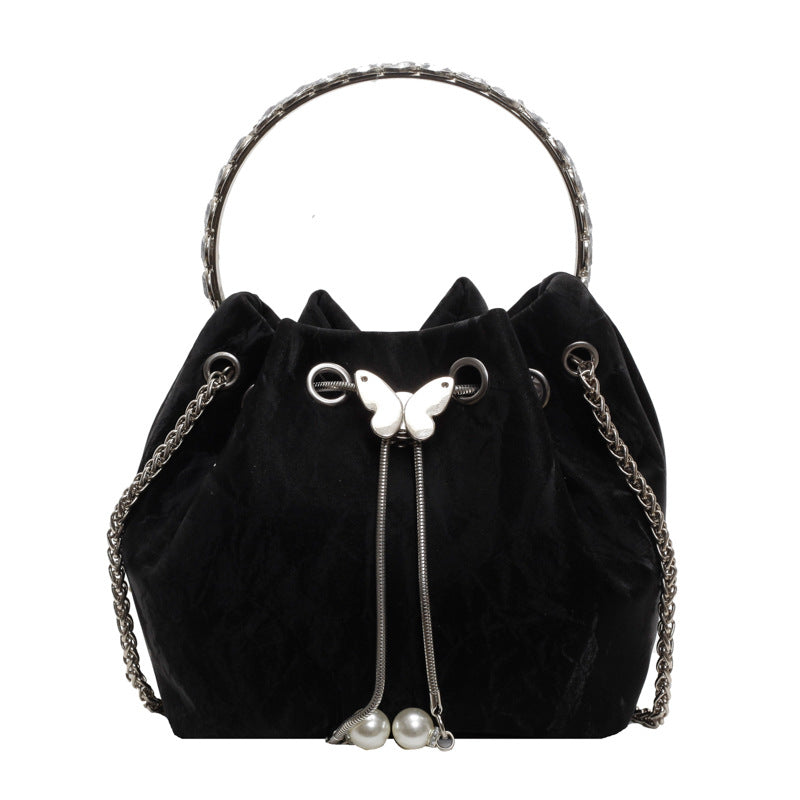 Bolso de mano elegante con cadena de mariposa plisada de color sólido para mujer