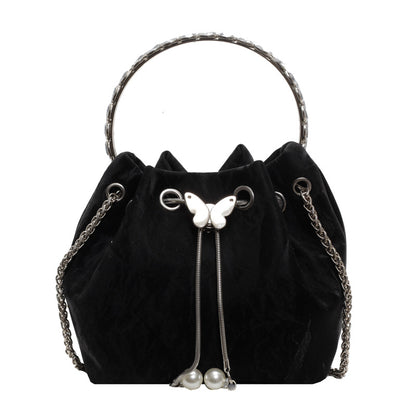 Bolso de mano elegante con cadena de mariposa plisada de color sólido para mujer
