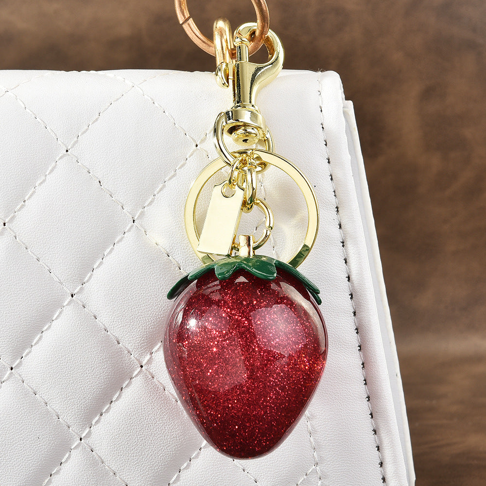 Llavero con colgante de resina de fresa multicolor para bolso