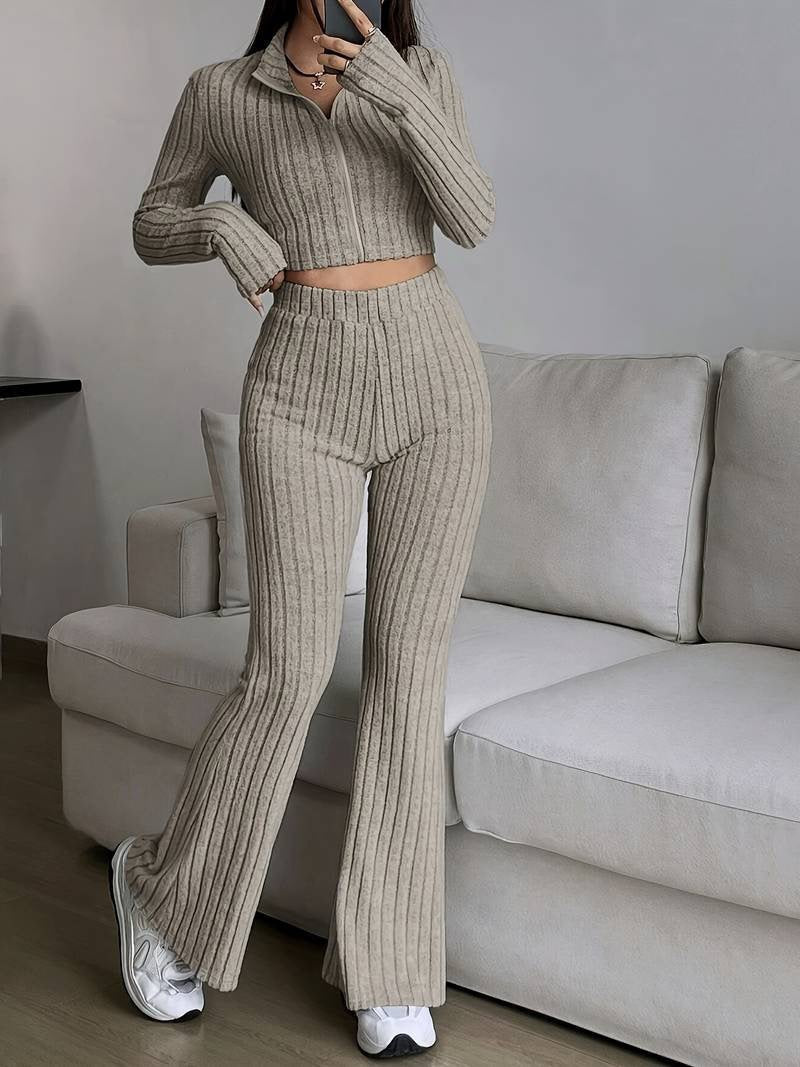 Conjunto de top y pantalón de manga larga con cremallera informal a la moda para mujer