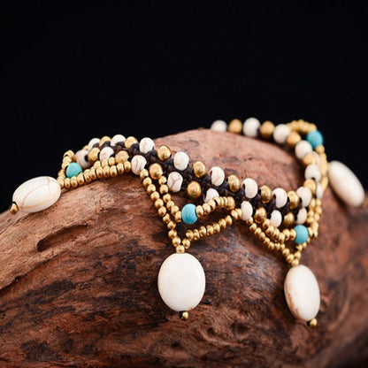 Tobillera bohemia con borlas trenzadas hechas a mano