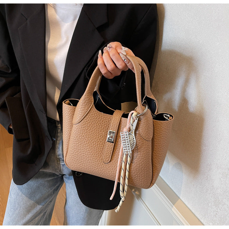 Sac à main seau décontracté de couleur unie pour femme avec motif litchi