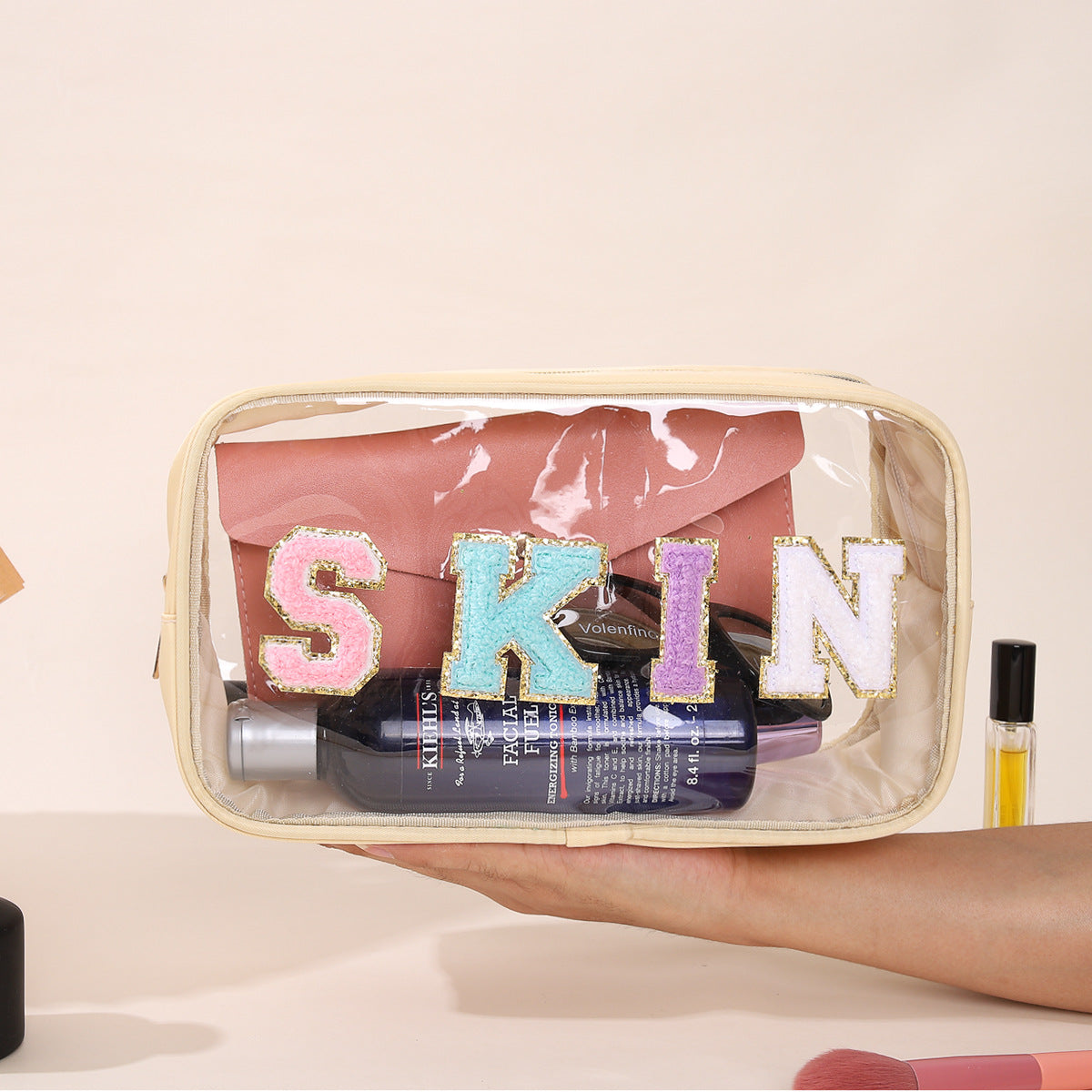 Bolsa de cosméticos impermeable de PVC transparente con letras bordadas