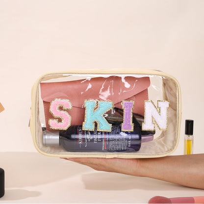 Bolsa de cosméticos impermeable de PVC transparente con letras bordadas