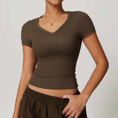 Camiseta de yoga informal de color liso con cuello en V para mujer