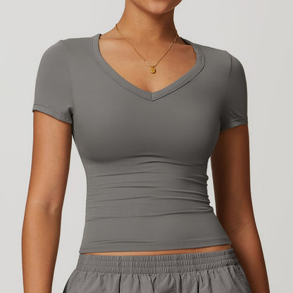 Camiseta de yoga informal de color liso con cuello en V para mujer