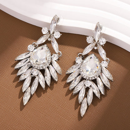 Pendientes de borlas ovaladas exageradas con diamantes de imitación y estilo geométrico para mujer